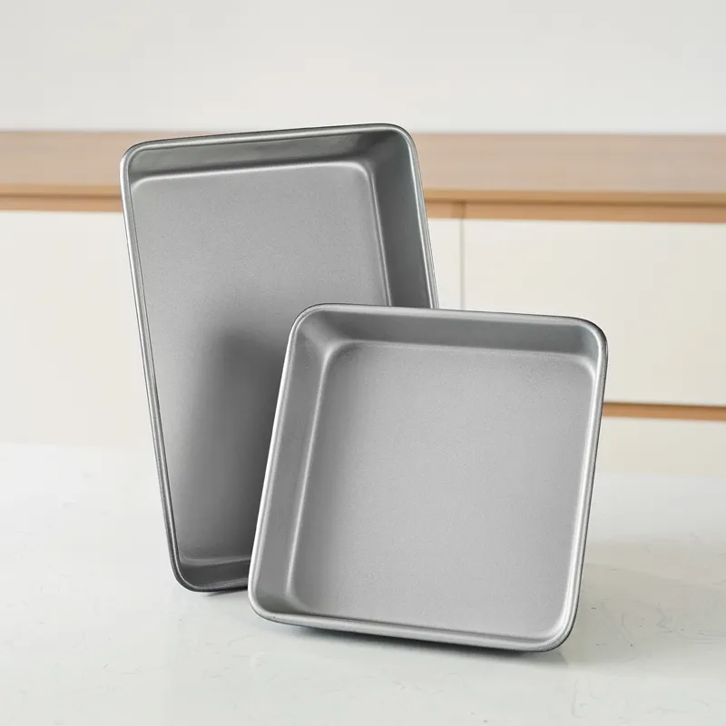 set of two carbon steel baking trays with silver-gray nonstick coating of a rectangle baking pan and a square baking pan